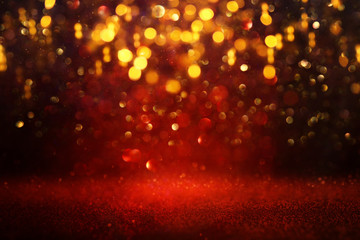 background of abstract red and gold glitter lights. defocused - Powered by Adobe
