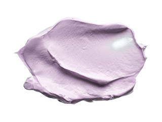 Gently purple texture and strokes of a facial cleansing mask or acrylic paint isolated on a white background