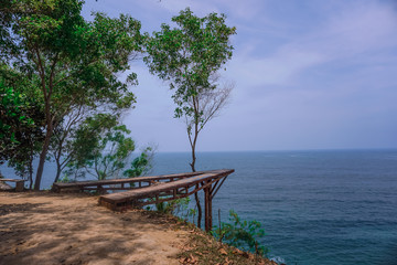 Fototapeta na wymiar Interesting photo spot on the hill at Watu Bale Beach, Kebumen, Central Java, Indonesia