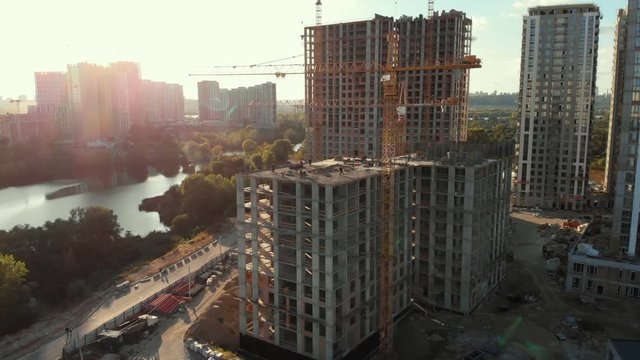 Cranes construction city industry building job drone aerial sunset