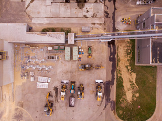 Factory on which processing of a tree and manufacturing of things from a tree is made. Flat view. Shooting drone from the air. 
