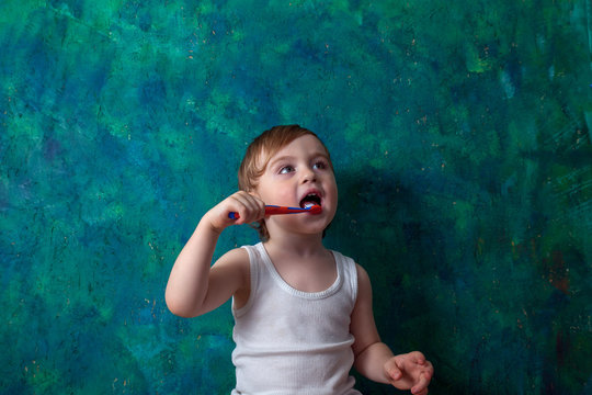 Child brushing teeth. Kids tooth brush and paste.Dental hygiene and heath for children.