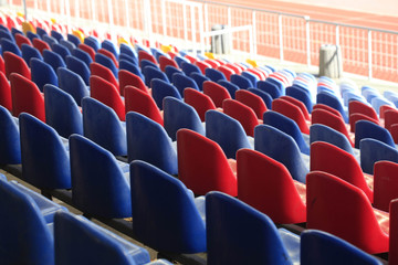 Fototapeta premium colorful stadium seats in park
