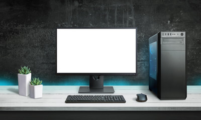 Gaming PC mockup. Modern case with blue RGB light. Black wall in background.