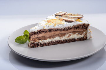 delicious cake with chocolate cream on a gray plate1