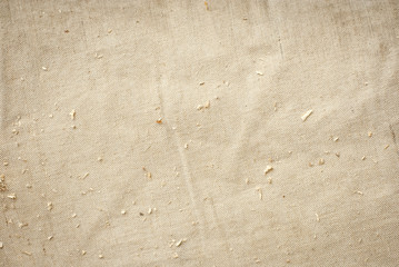 Texture of old dirty bag closeup. Torn and dirty cloth. Knitted linen rag.