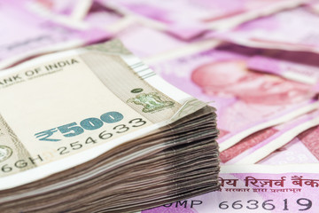 Closeup of the portion of  500 rupees Indian Currency  with 2000 rupee notes as out of focus background