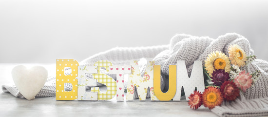 Mother's day holiday background, with flowers and lettering.