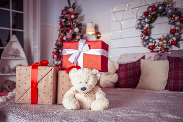 Christmas mood, decorated room with gifts and toys. Waiting for a miracle, New Year decorations