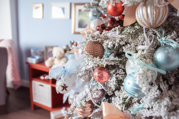 White decorated Christmas tree close-up, space for text, New Year mood, delicate pastel colors