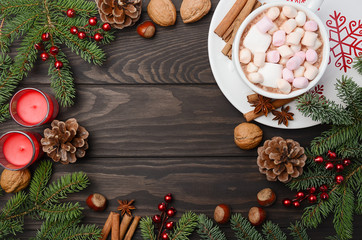 Christmas background with Hot chocolate and Christmas decorations. Top view, horizontal with copy space.