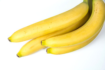 bananas against white background. four things