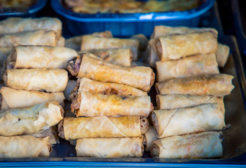 fresh sausage rolls at a market