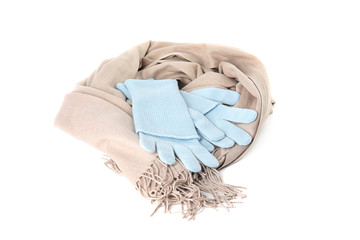 Stylish gloves and scarf on white background. Autumn clothes