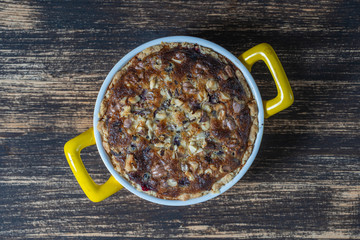 Homemade organic currant pie with walnut, dessert ready to eat. Currant tart on the old wooden background, closeup