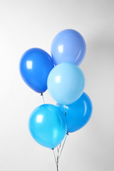 Bunch of blue balloons on white background. Greeting card