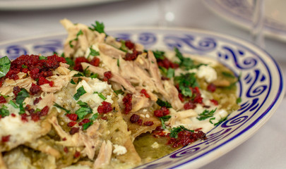 Green sauce chilaquiles and chicken