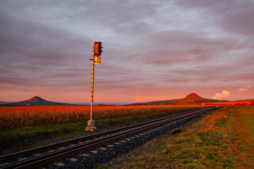 Morning train to the hell. Single railway track at sunrise