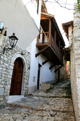 Narrow street with traditional old houses in Berat Albania.