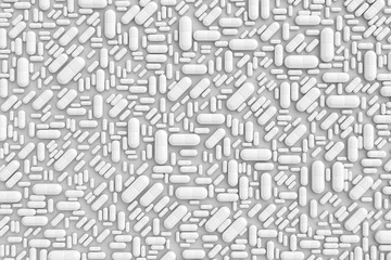 A pattern of many pills scattered on a colored background evenly at different angles. 3D illustration
