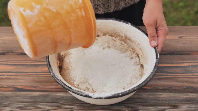Making dough for baking homemade bread.