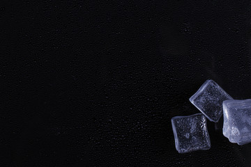 Beautiful ice cube on a black background.