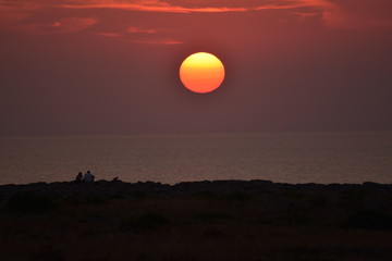 Couple watching the sunset