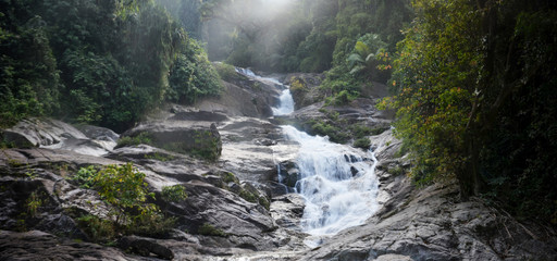 Naklejka na ściany i meble waterfall in forest at national park. paronama, Travel thailand