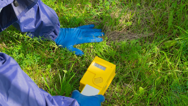 dosimeter showing a large excess of radiation background in the ground.