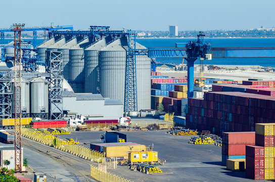 Granary with containers for storage and loading of grain in the seaport. Grain transportation, agribusiness