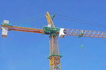 Lifting faucet on a background sky