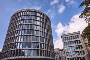historic, modernist building in the shape of a cylinder in Poznan.