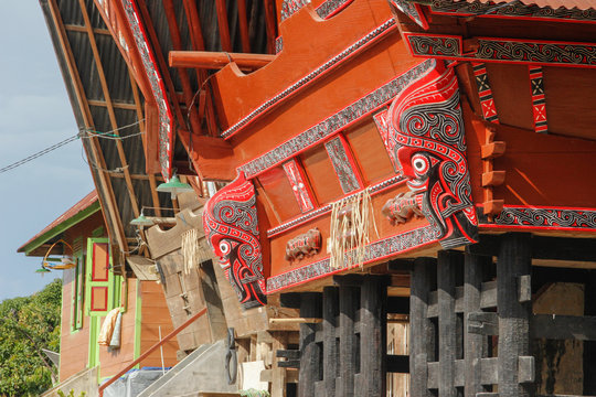 Parapat, Sumatra - January 30, 2018: unusual traditional house architect with roof-boats of the Batak people on the island of Sumatra, Indonesia. Home decoration elements.