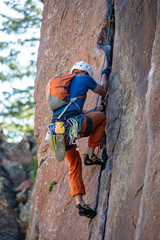 climber on top of mountain