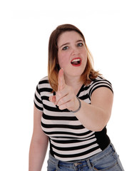 Young woman shouting and pointing finger