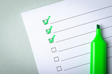 Check list and green marker
