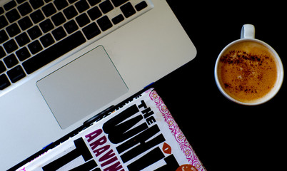 The 3 essentials: coffee, laptop and a good book