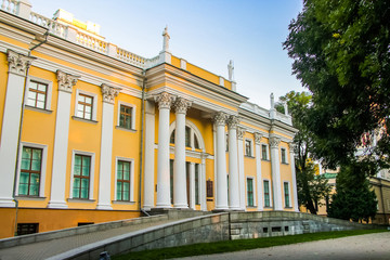 Beautiful old house and tower on a background of blue sky