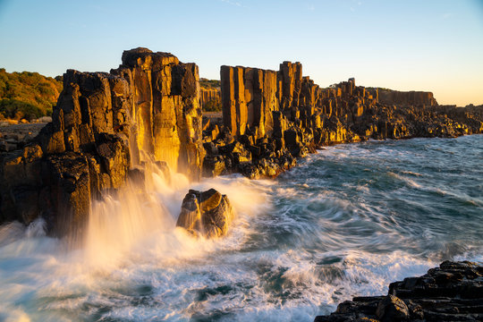 Wvaes of the Ocean crashing on to basalt rocks at Bombo Quarry