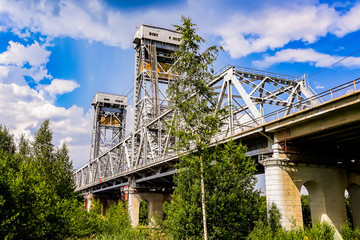 Huge metal railway bridge across the river