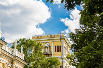 Beautiful old house and tower on a background of blue sky