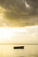 boat on lake golden hour