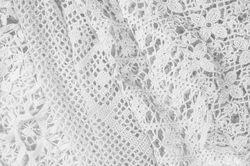Abstract vintage white background, knitted homemade delicate lace of crochet napkins in retro style, closeup - obrazy, fototapety, plakaty