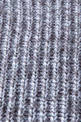 Knitting Seamless Pattern. Grey wool background. Old handmade knit