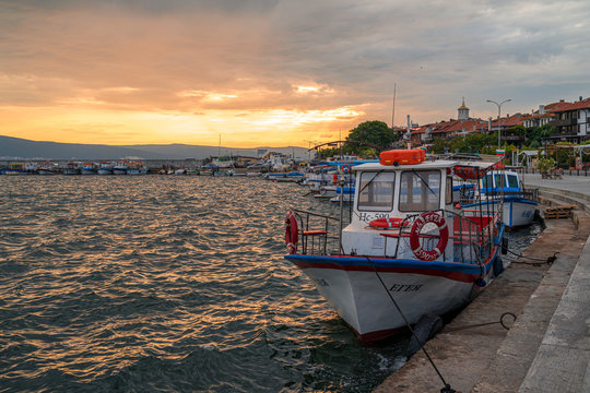 Pleasure boat stands near the pier  on June 22, 2019 in Nessebar, Bulgaria.