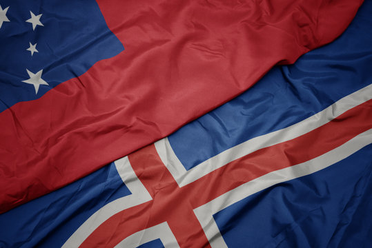 waving colorful flag of iceland and national flag of Samoa .