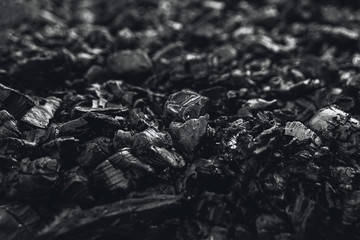 Dark coal texture, coal mining, fossil fuels, environmental pollution.