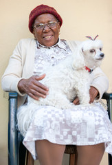 Old African woman and dog
