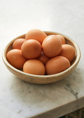 Brown eggs in bowl