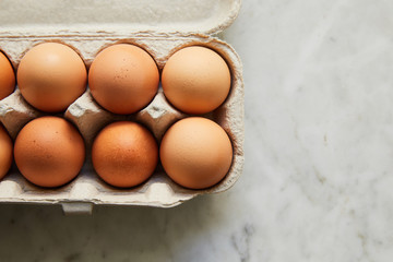 Brown eggs in carton